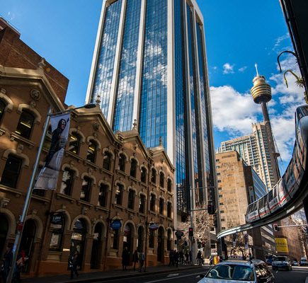 Monorail passing over with Sydney Tower Eye